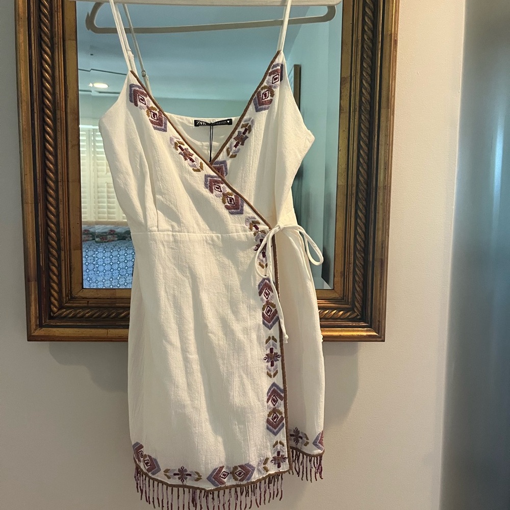 Zara white mini wrap dress with purple beading detail. Size M.